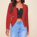 Close-up detail of women's red cropped open-front blazer with decorative zipper pockets - S / Tops / Red