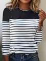Detail view of a women's round neck long sleeve T-shirt with black and white stripes. - S / Tops / Black