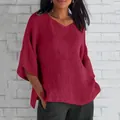 Detailed view of loose-fit V-neck maroon linen-textured top with medium sleeves for women - S / Tops / Rose Purple