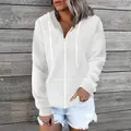Detailed macro shot of white quilted fabric texture on hooded zip-up sweatshirt for women - 3XL / Tops / White