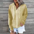 Detailed view of the mustard yellow waffle knit texture on this hooded zip-up sweatshirt - 3XL / Tops / Yellow