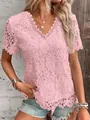 Detailed view of women's pink lace short sleeve top featuring V-neckline and rose pattern - S / Tops / Pink