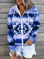 Close-up view of women's blue geometric print zip-up hoodie showing print details - S / Tops / Blue