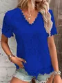 Detail of royal blue short-sleeve lace top with elegant V-neck and floral texture - S / Tops / Blue