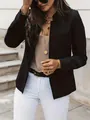 Dettaglio di un blazer nero con colletto alla coreana, abbinato ad accessori color oro. - Taglia S / Top / Nero