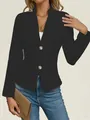 Close-up detail of women's black slim-fit textured blazer jacket with two buttons - S / Tops / Black