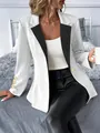 Detail of women's white blazer with black lapel and textured geometric pattern. - S / Tops / White