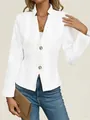 Detail view of a white textured long-sleeve slim blazer jacket with two golden buttons. - S / Tops / White