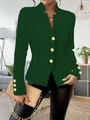 Detail eines eleganten dunkelgrünen Langarm-Blazers mit geprägten Goldknöpfen und Passform. - Grün