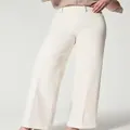 Women's off-white wide-leg jeans with high elastic waist and washed denim texture - XS / Bottoms / White