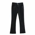 Vaqueros acampanados negros de cintura alta para mujer con corte entallado y bajo deshilachado. - S / Bottoms / Negro