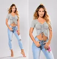 Detail view of women's ripped denim jeans with pink rose floral embroidery - S / Light Blue