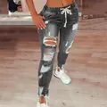 Γυναικείο γκρι skinny τζιν με σκισίματα, ψηλή μέση και ελαστική ζώνη με κορδόνι περίσφιξης - S / Γκρι