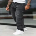 Men's casual loose-fit patchwork denim jeans in a stylish charcoal grey wash finish - Black and Gray