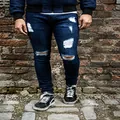 Stylish dark blue distressed skinny jeans with ripped knee details for modern men - 3XL / Bottoms / Navy Blue