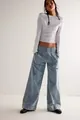 Fashionable low-waist wide-leg denim trousers in light blue wash for a trendy look - S / Bottoms / Light Blue