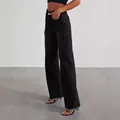 Detail of washed black wide-leg denim jeans with a high-waisted fit and raw hem - S / Bottoms / Black