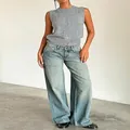 Detail of vintage low-waist wide-leg jeans with washed denim finish for a street style look - XS / Bottoms / Mid Blue 2 (207)