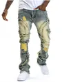 Detail shot of distressed flared jeans for men with yellow patches and fringe - S / Bottom (8938) / Yellow