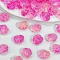 Close-up detail of translucent pink rose-shaped glass beads for DIY jewelry making - Rose Style (L587) / 12x14x8mm / Rose Pink