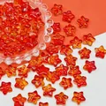 Close-up of 14x14x8mm red star-shaped glass beads for DIY jewelry, weighing 1.6g - 14x14x8mm / Gold Red (L683)