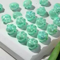 Mint green pearlescent cat paw shaped acrylic beads for DIY jewelry making projects - Light Green