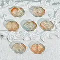 Detail view showing 9x13mm semi-transparent glazed cloud Ruyi beads for DIY accessories - Liuli Auspicious Cloud (L566) / Orange Blue