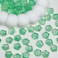 Macro view of translucent green cherry blossom glass beads for DIY jewelry accessories - Light Green