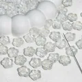 Detail macro view of transparent glass cherry blossom beads for handmade DIY jewelry crafting - Cherry Blossom / 12mm / Iridescent White
