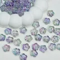 Macro shot of transparent gradient glass cherry blossom beads, measuring 12x12x7mm - Purple Multi