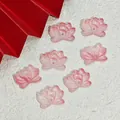 Macro detail of pink lotus-shaped double-hole glass beads for DIY jewelry crafts - Double Hole Lotus / Tender Pink (L853)