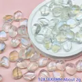 Macro-opname van iriserende glazen kralen met afmetingen van 12x16x8 mm - L662# Beige