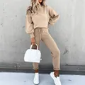 Women's two-piece tan knit set featuring a turtleneck top and matching jogger pants - S / Top And Bottom / Khaki