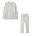 Vista dettagliata di un completo due pezzi bianco da donna con felpa a collo alto - Bianco avorio