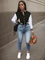 Chic black and white color-block varsity jacket with snap buttons for a trendy street look - S / Tops / Black