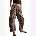 Detailed macro view showing the leopard print texture on wide-leg barrel denim pants - Leopard Print