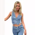 Casual light blue cropped denim vest waistcoat for women shown on a fashion model - S / Tops / Dark Blue