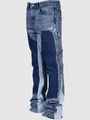 Side detail of men's patchwork denim carpenter flare pants with paint splatter elements - S / Bottoms / Dark Blue