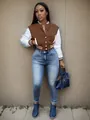 Fashionable brown and white color-block varsity jacket paired with slim denim jeans - Brown