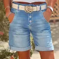Detailed view of women's light blue cuffed denim shorts with button fly design - S / Bottoms / Light Blue