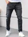 Detail shot of men's dark grey slim-fit stretch jeans with distressed accents - S (28) / Bottoms / Black