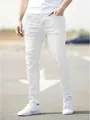 Λεπτομέρεια από ανδρικό λευκό ελαστικό skinny τζιν με στενή εφαρμογή και φθορές - Λευκό