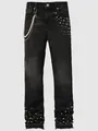 Detailed view of men's black straight-leg jeans with pearl embellishments and stacked hem. - S / Bottoms / Black