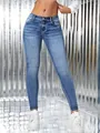 Vista detallada de vaqueros pitillo azules elásticos para mujer con corte tobillero - S / Bottoms / Azul