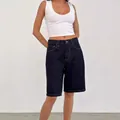 Premium women's vintage loose-fit denim mid-length shorts in a dark indigo wash - S / Bottoms / Black Blue