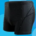 Detail view of quick-dry black swim trunks with visible water droplets on fabric. - 4XL / Bottoms / Black (Striped)