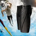 Detailed view of men's shark skin swim jammers with water-repellent texture and black finish - L / Bottoms / Black
