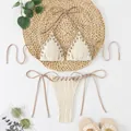 Detail view of cream ribbed bikini set with lace-up eyelet design and halter ties - S / Top And Bottom / Off White