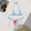 Close-up of a light blue two-piece split bikini set with elegant pink floral print - S / Top And Bottom / Red Floral on Sky Blue