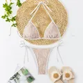 Detailed view of white lace bikini set with nude lining and adjustable tie straps - S / Top And Bottom / White Lace and Nude